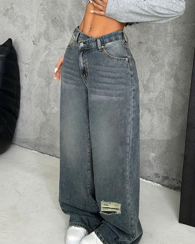 Distressed denim jeans