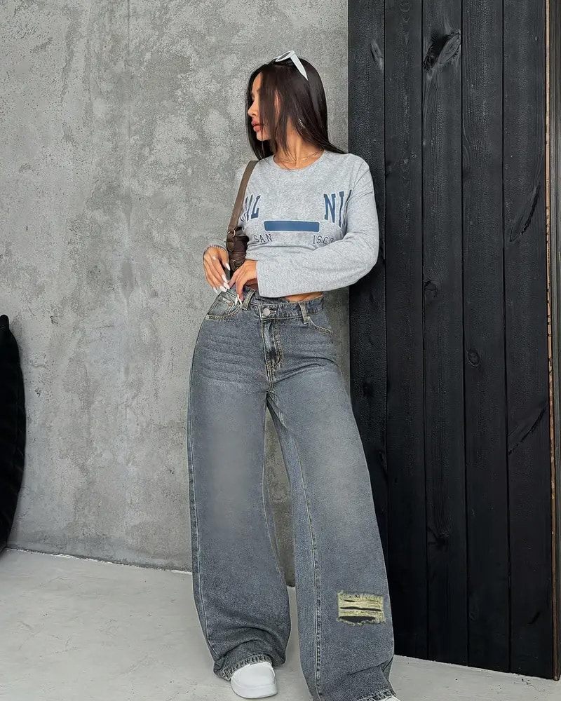 Distressed denim jeans